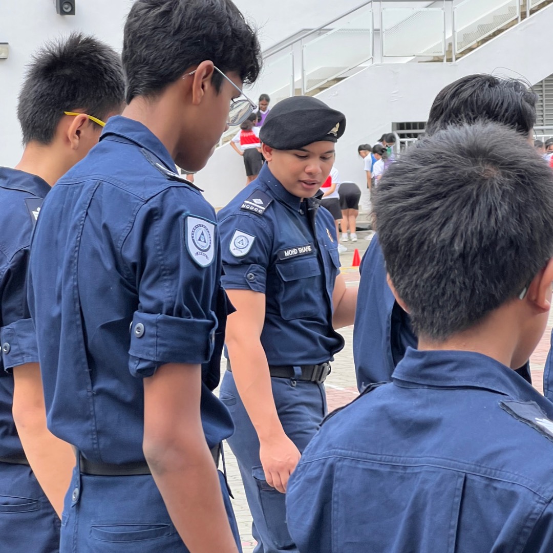 (CLT) Shafie with National Civil Defence Cadet Corps members from Christ Church Secondary school.