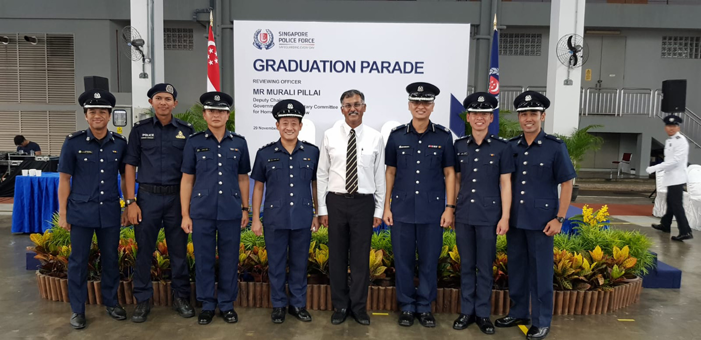 DAC (NS) Lok Weng Hoe (third from right) believes in instilling leadership skills in Home Team NSmen.