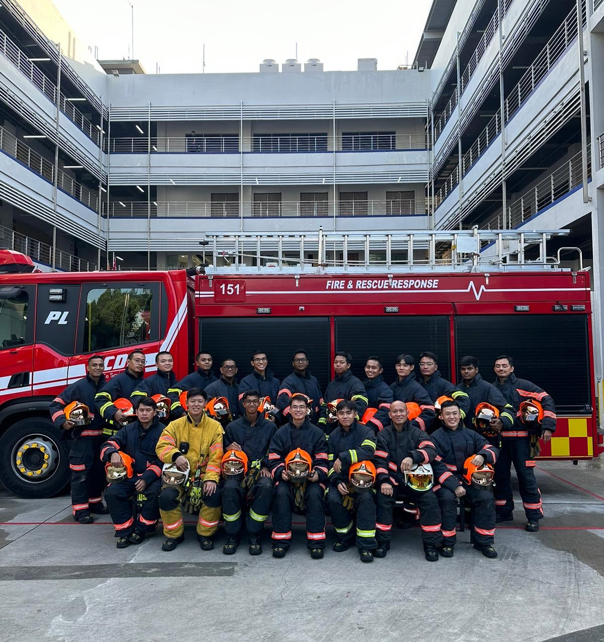 Nikhil (second row, sixth from left) with his Rota at Bishan Fire Station. His experience on the frontlines taught him the value of teamwork.