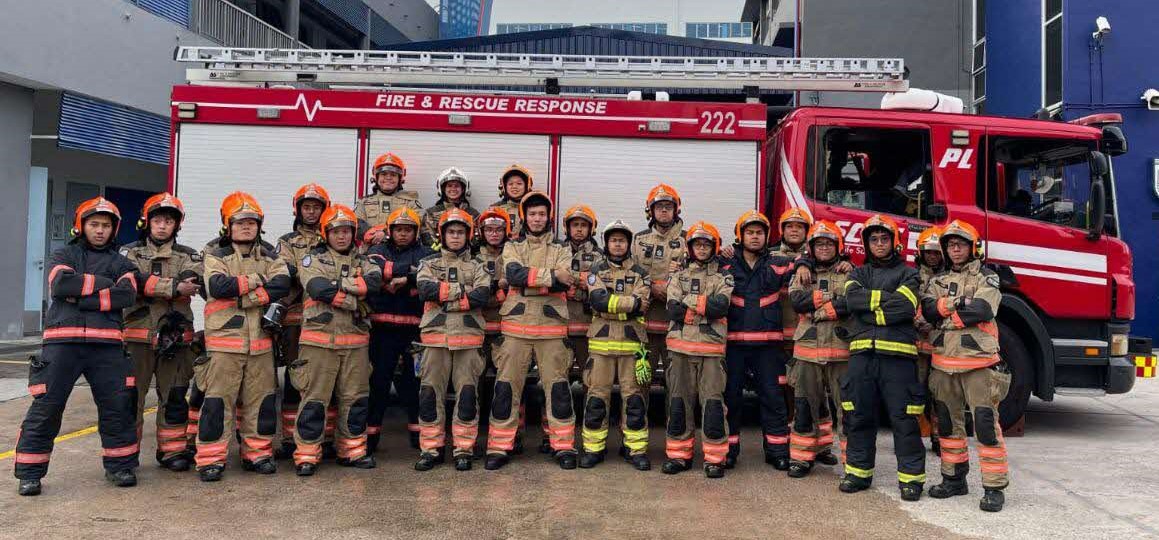 Leading her team has been a humbling, yet fulfilling, experience for Priscilla (third row, white helmet).