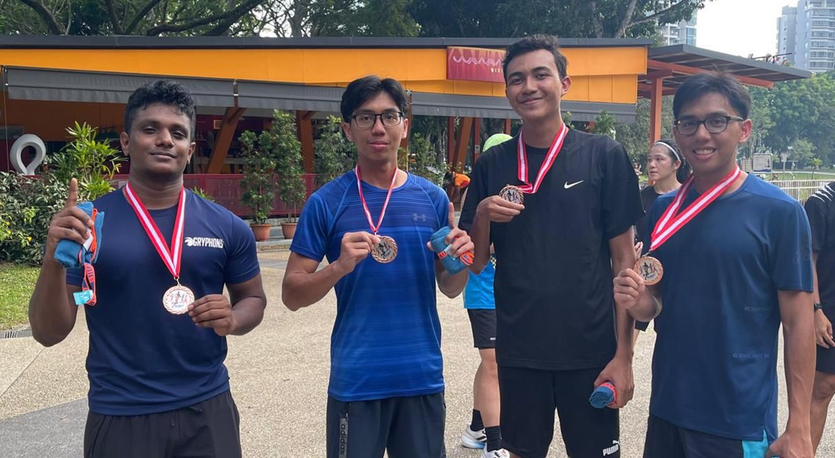 Outside of work, Irfan (first from right) and Arfan (third from right) bond over sports, such as cross-country runs.