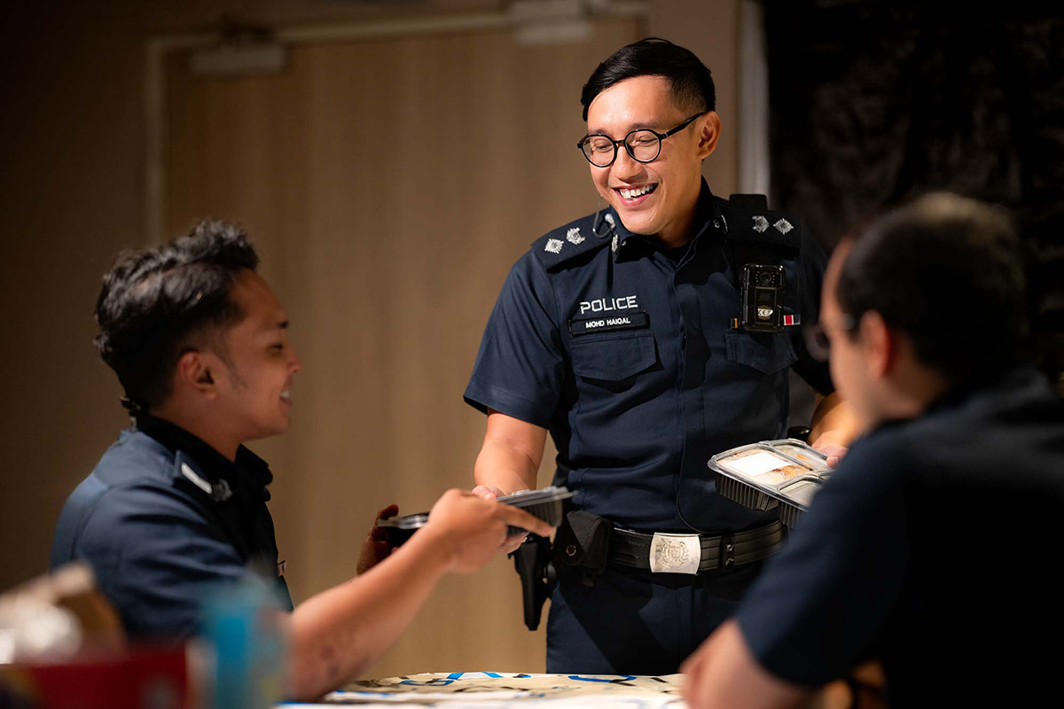 As Muslim officers have their evening meal, their colleagues keep the watch – a testament to the camaraderie that makes the annual bazaar deployment special.
