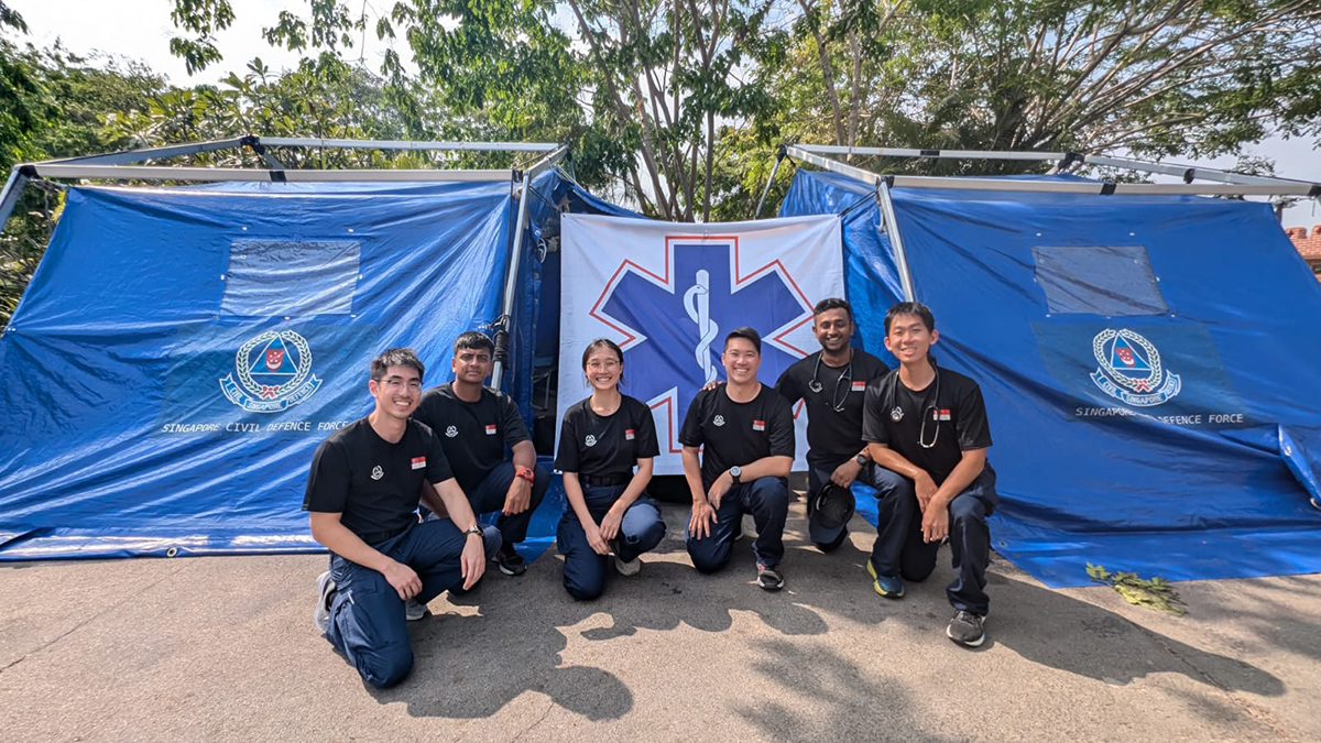 The six-member SCDF medical team in Myanmar. From left: Paramedics SGT3 Glenn Chua Chen Hwee, WO1 Divanraj Batumalai, LTA Joanne Lau and WO1 Au Lon Chiu Ben, with CPT (Dr) Sarvananthan Rajragavan and CPT (Dr) Quek Seng Leong.