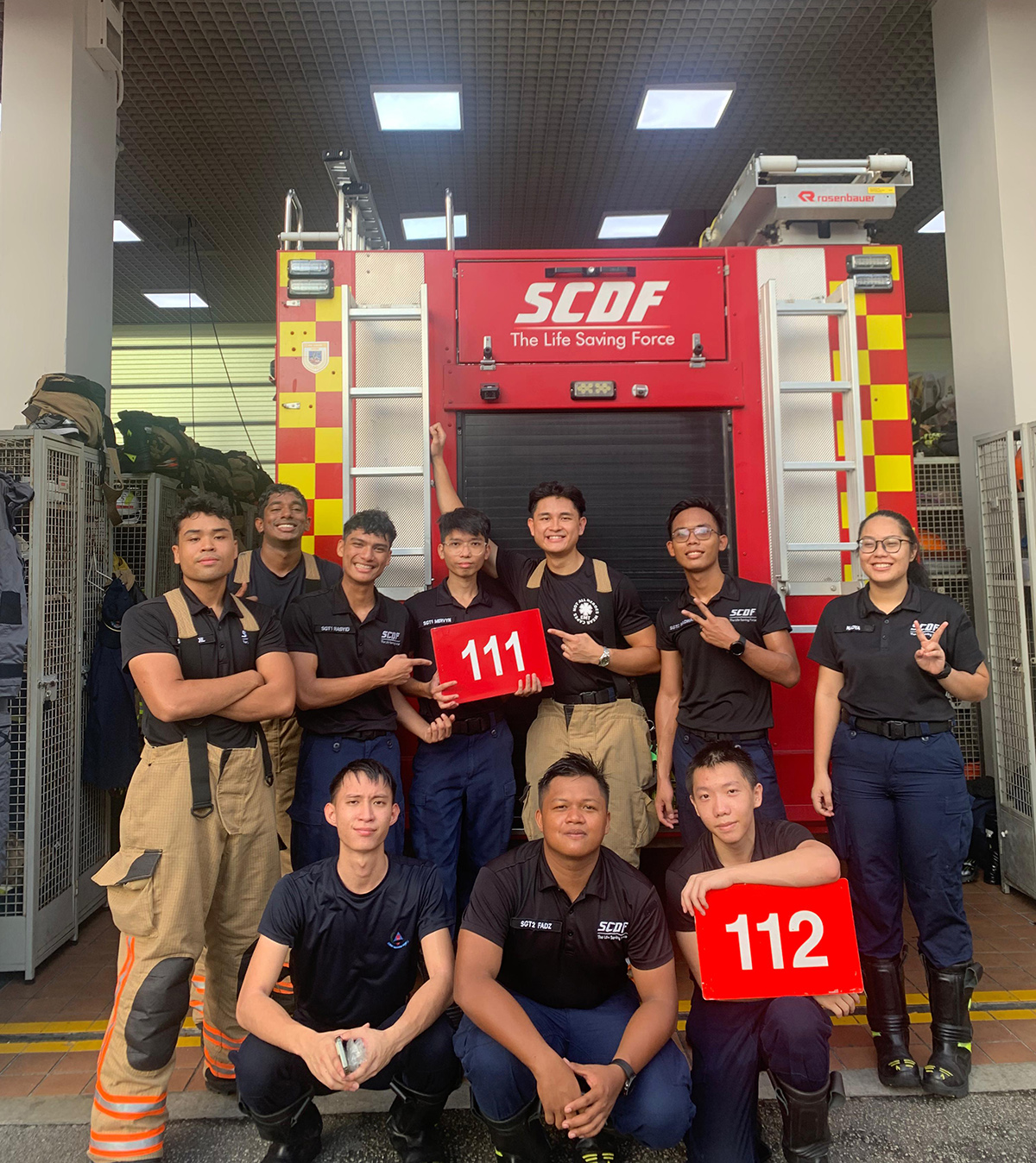 Mervyn (back row, fourth from left) and his colleagues from Central Fire Station are proud of what they do every duty.