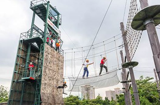 NSmen attempting the rope course at Adventure Centre