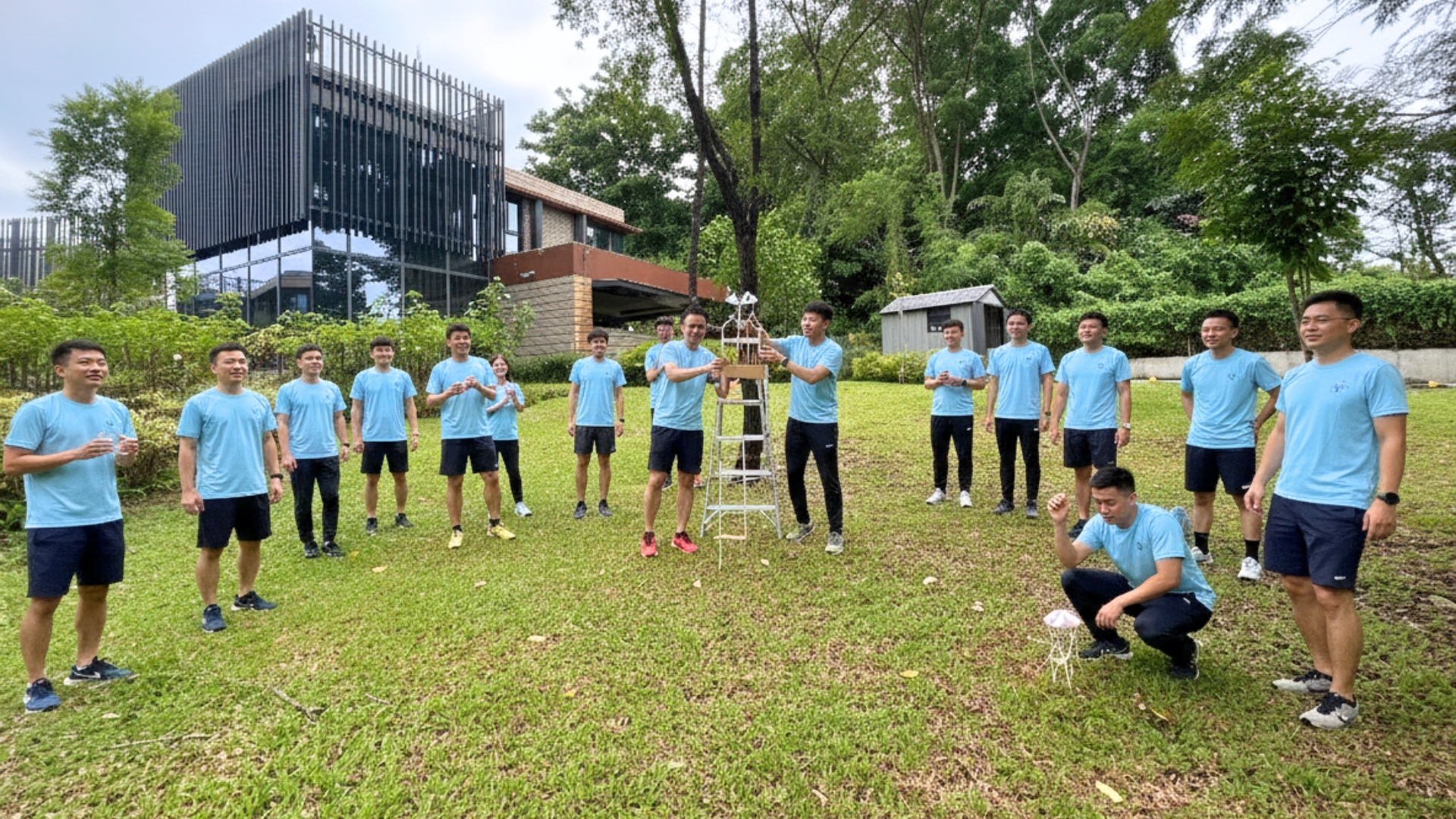 East Villa Corporate Sales 8 Corporate team participating in outdoor group activity on East Villa’s lawn at HomeTeamNS Bedok Reservoir.