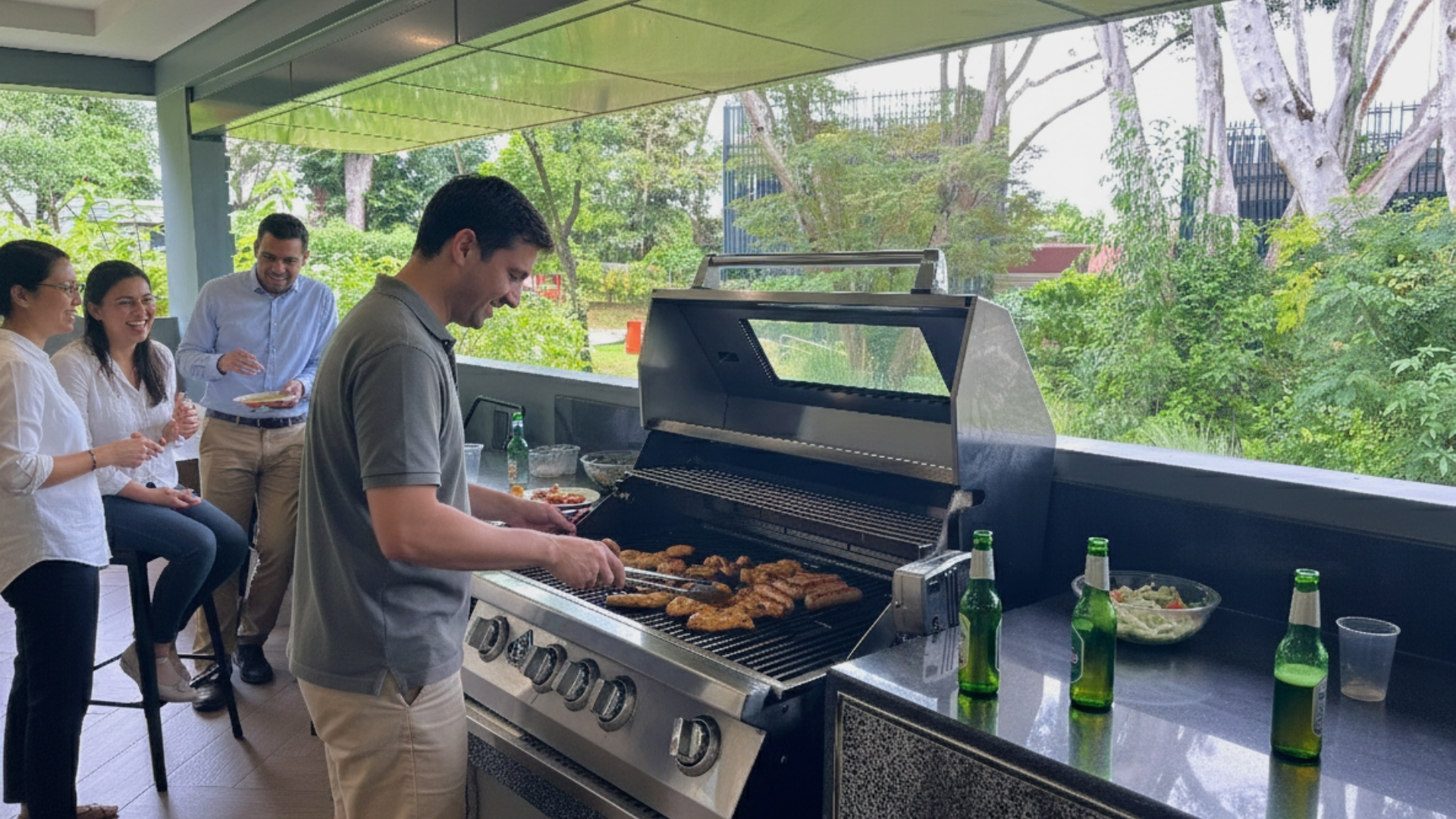 East Villa Corporate Sales 10 Corporate guests enjoying a private BBQ session at East Villa’s outdoor grill area surrounded by greenery.