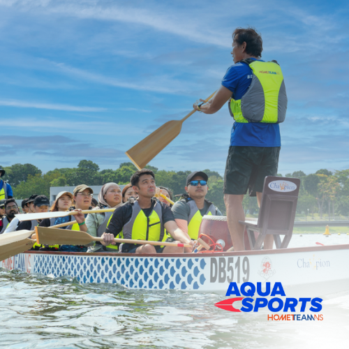 East Villa Corporate Sales 30 Corporate team paddling together during a dragon boat activity at Aqua Sports, HomeTeamNS Bedok Reservoir.